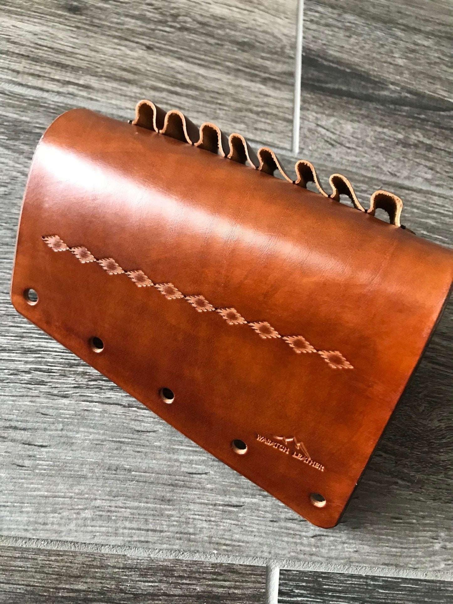 Buttstock Sleeve and Shell Holder with Tooled Strip