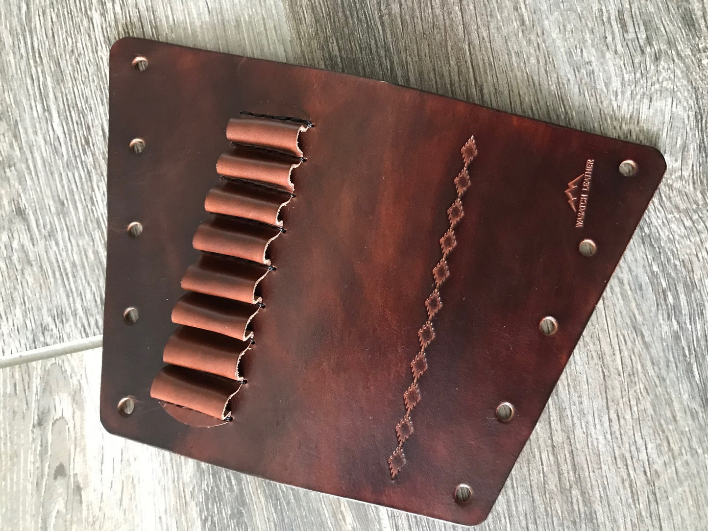 Buttstock Sleeve and Shell Holder with Tooled Strip