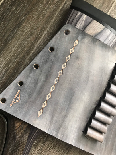 Buttstock Sleeve and Shell Holder with Tooled Strip
