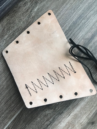 Buttstock Sleeve and Shell Holder with Tooled Strip